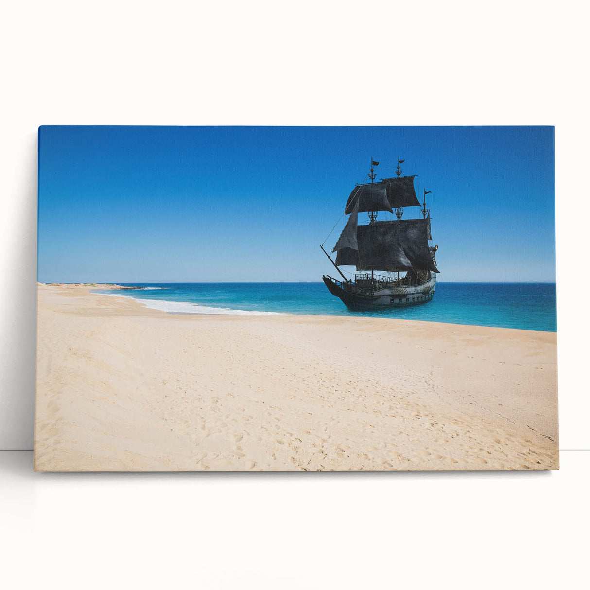 Black and white photo of a ship on calm waters, printed on large stretched canvas.