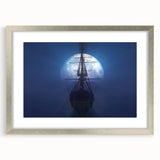 Abstract art print of a ship in muted blue and white tones, framed in silver, ideal for dining room decor.