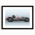 Abstract art print of race cars, in bold, colorful textures on a large black-framed canvas, ideal for living room decor.
