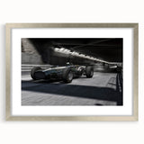 Textured abstract art print featuring blurred race cars in vibrant colors on a silver-framed mat, suitable for bedroom decor.