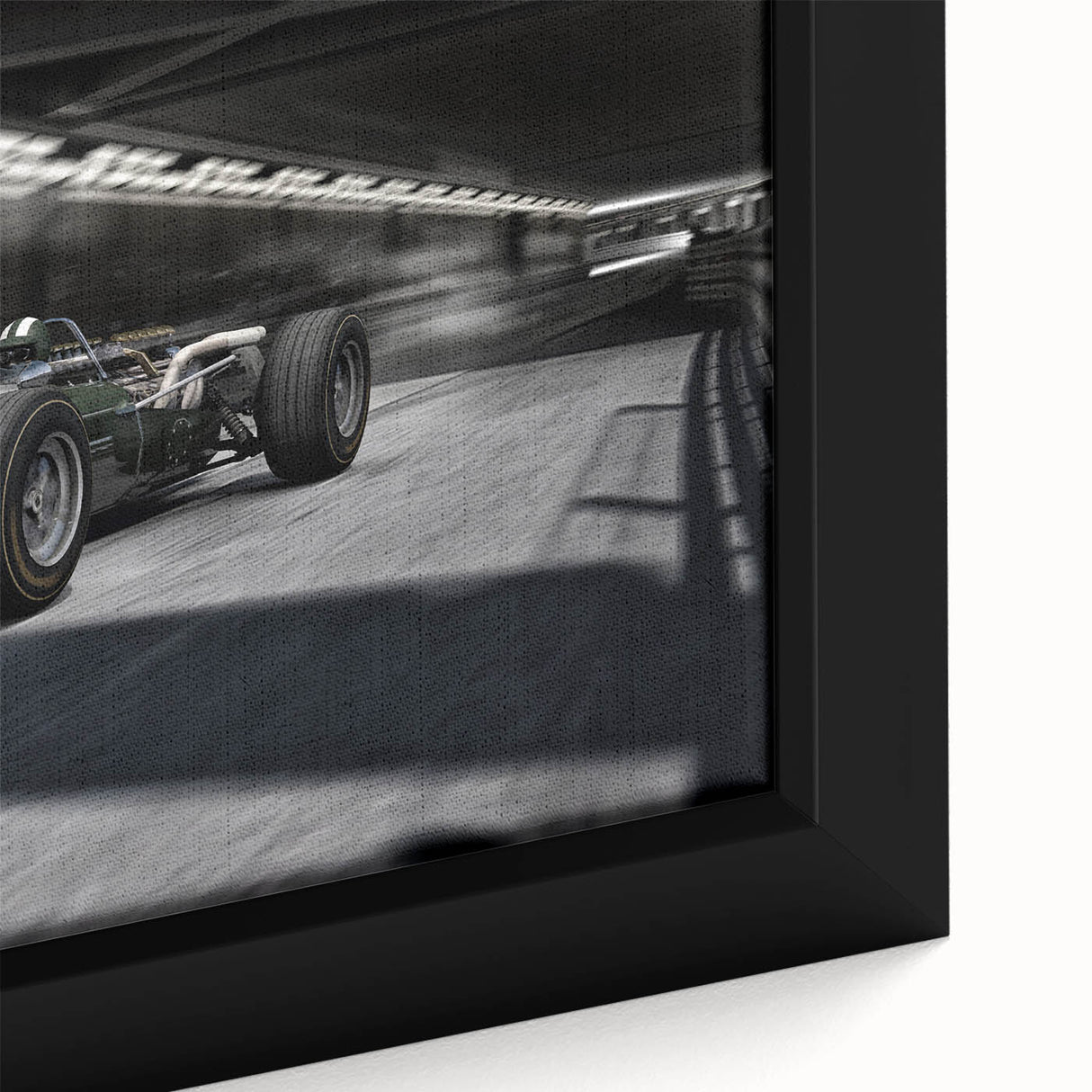 Extra large framed canvas of colorful race cars in motion on a textured black background, ideal for living room decor.