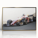 Mid-century modernist style race cars in dynamic motion on a framed acrylic print in gold tones.