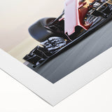 Art deco poster featuring a lineup of vintage race cars in vibrant red and blue tones on rolled canvas.