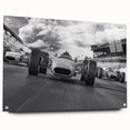 Acrylic print of race cars in motion, featuring vivid red and blue tones, ideal for modern bedroom or dining room decor.