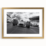 Extra large abstract art print featuring a dynamic race car scene in bold, textured colors on a gold-framed canvas.
