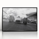 Large abstract wall art depicting race cars in motion.