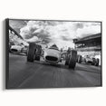 Black and white wall art featuring a side view of vintage race cars on a framed canvas, suitable for bedroom decor.