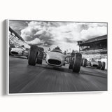 Framed canvas of vintage poster art featuring colorful race cars on a black background, ideal for living room decor.
