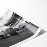 Extra large wall art featuring a dynamic race car scene in vibrant colors on a rolled print.