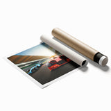 Rolled print of a car race featuring multiple vehicles in vivid colors, suitable as large living room wall art.