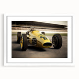 Abstract art print of race cars in motion, using blurred lines and a monochrome palette, framed with a white mat.