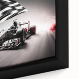 Close-up of extra large framed canvas featuring black wall art with colorful, textured race cars.