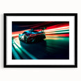 Extra large abstract art print of colorful race cars, textured style on black framed canvas, ideal for living room.
