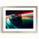 Abstract art print featuring a textured depiction of race cars, in a silver frame, suited for bedroom decor.