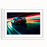 Abstract art print featuring a dynamic race car scene in vivid red and blue tones on a white framed canvas.