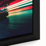 Extra large black wall art featuring a close-up of colorful, textured race cars on framed canvas.