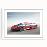 Abstract art print of a stylized sports car in black and white, framed with a white mat.