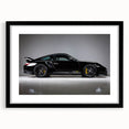 Colorful abstract art print featuring textured sport cars, in a black frame with mat, ideal for large living room walls.