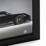 Extra large framed canvas featuring a close-up of a black sports car with colorful, textured detailing.