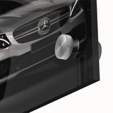 Large abstract wall art of a sports car in vibrant red and black on acrylic glass, suitable for dining room ambiance.