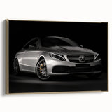 Gold-framed canvas of a side view of a vintage sports car, in black and gold tones, suitable for bedroom wall decor.
