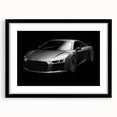 Abstract art print of colorful sports cars, textured on large canvas, framed in black, suitable for living room decor.