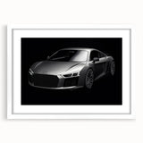 Abstract art print of a stylized sports car in bold black and red tones on a white framed canvas.