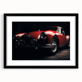 Abstract art print of colorful, textured sports cars on a large black-framed canvas, ideal for living room decor.
