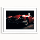 Abstract art print of a stylized sports car in vibrant red and black hues on a white framed mat.