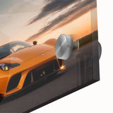 Large abstract wall art of a sports car in vibrant colors on acrylic glass, suitable for dining room decor.