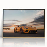 Front view of a gold sports car in a framed acrylic print, featuring mid-century modernist style.