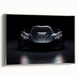 Framed canvas featuring a side view of a vintage sports car in black and silver tones, ideal for decorating a home office.