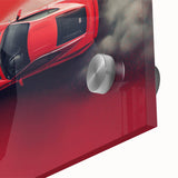 Large abstract wall art of a sports car in vibrant red and black hues on acrylic glass, fitting for dining room ambiance.