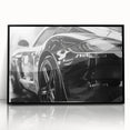 Large abstract wall art of a black sports car in mid-century modernist style, framed in acrylic.