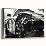 Silver sports car in profile on a black background, framed canvas, ideal for modern office decor.