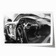 Rolled print of a sports car in vivid red and black tones, suitable for art wall dining room.