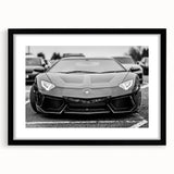 Abstract art print of a colorful, textured sports car on a large canvas, framed in black, suitable for living room decor.