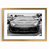 Extra large abstract art print featuring a textured depiction of sports cars in muted metallic tones on a gold-framed canvas.