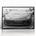 Large abstract wall art featuring a black sports car, in mid-century modernist style, on a framed acrylic print.