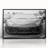 Large abstract wall art featuring a black sports car, in mid-century modernist style, on a framed acrylic print.