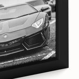 Extra large framed canvas featuring a close-up of a black sports car, with colorful, textured art accents.