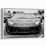 Vintage poster art of a classic car in black and white on a framed canvas, ideal for living room decor.