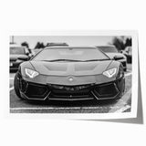 Extra large rolled print of a sports car in vibrant red and black tones, suitable for modern dining room decor.