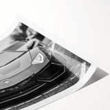 Extra large wall art featuring a sports car in vibrant red on a rolled print, suitable for large living room decor.