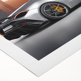 Art deco poster of a vintage sports car in monochrome, printed on rolled canvas, suitable for dining room decor.