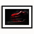 Abstract art print of colorful, textured sports cars, on a large black-framed canvas, ideal for living room decor.