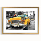 Extra large abstract art print of a textured taxi in muted yellow and gray tones on a framed canvas.