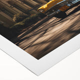Art deco poster featuring a classic yellow taxi, in bold black and yellow tones, on rolled canvas.