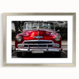 Textured art print of vintage cars in muted earth tones on a framed canvas, suitable for bedroom decor.