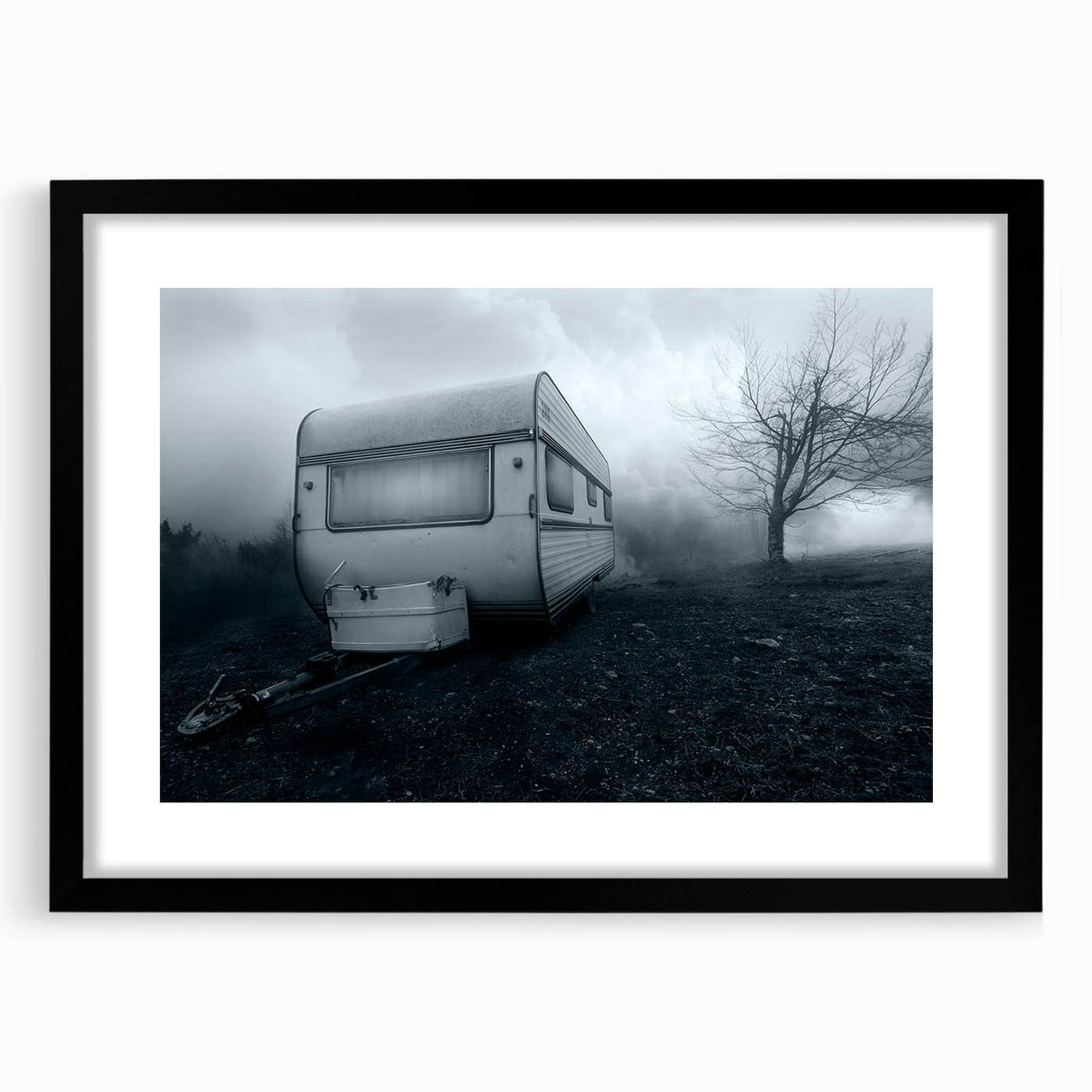 Colorful abstract art print featuring a textured caravan design in vibrant hues, framed in black.